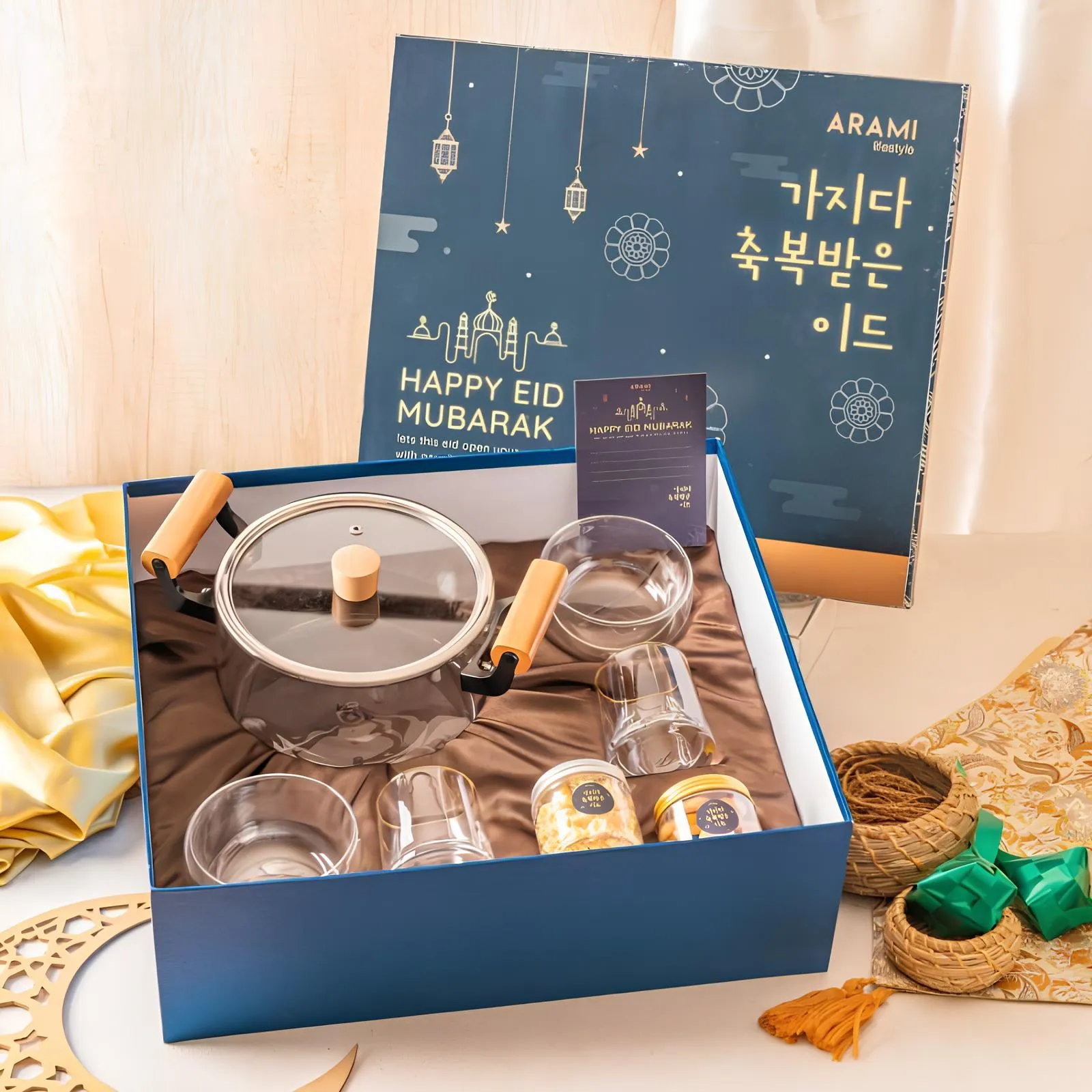 Eid kitchen hampers with Islamic-themed ceramic plates.