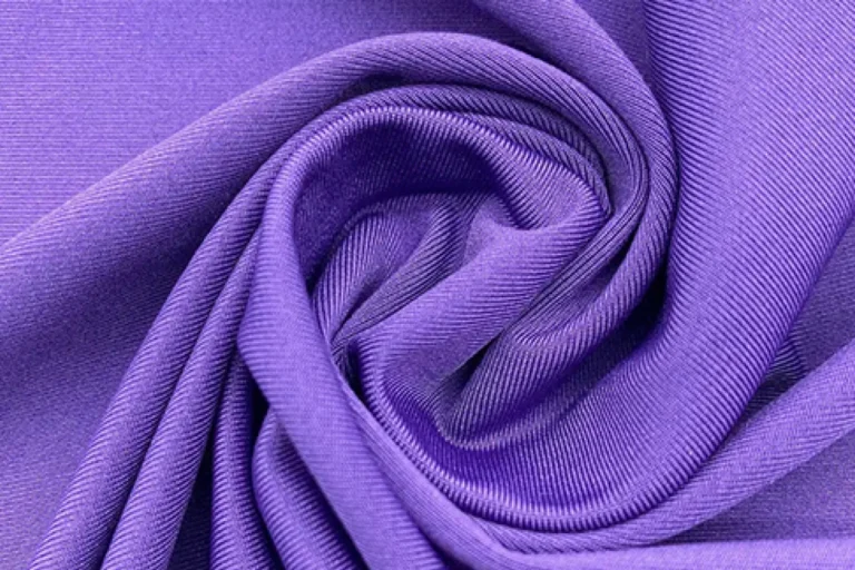 Spandex jersey fabric featuring high elasticity and smooth finish, perfect for fitted activewear and stylish casual outfits