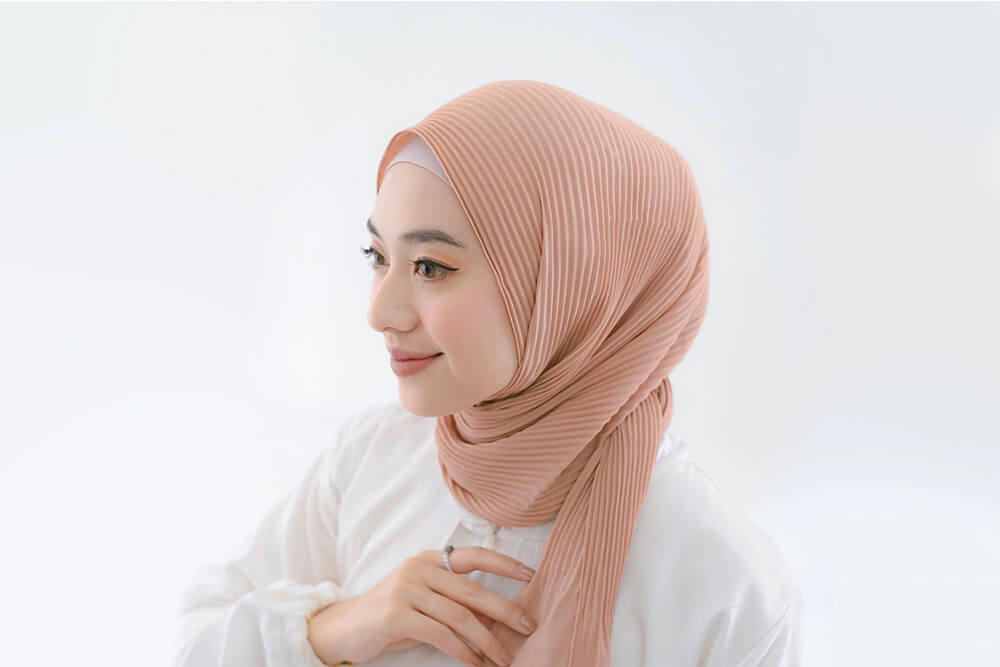Stylish Pleated (Plisket) Hijab style, featuring neat, structured pleats that add texture and dimension to your look